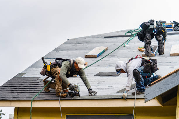 Professional Roofing technician working in Russell, PA